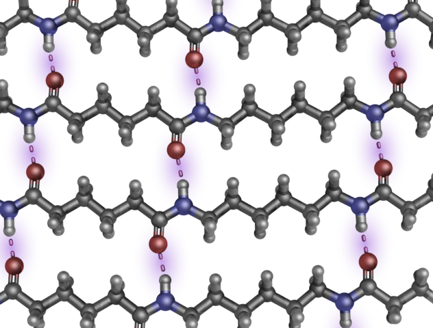 Nylon 6-6, en lila los enlaces de hidrógeno que unen las distintas moléculas de polímero orientadas en una dirección